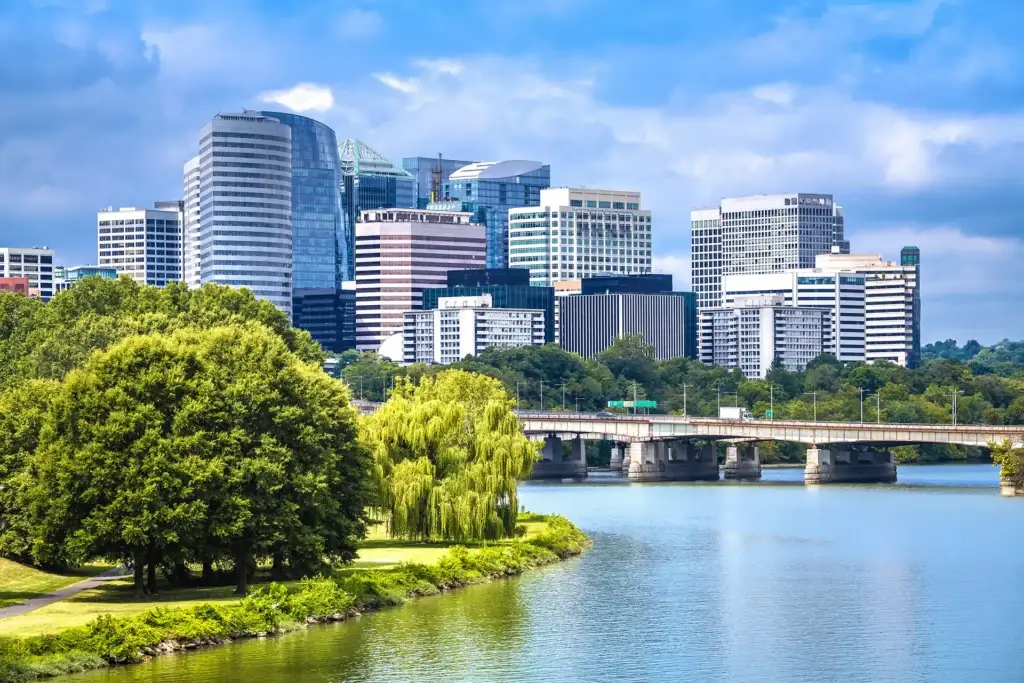 Rosslyn Virginia skyline with the Potomac River and Roosevelt Bridge representing Northern Virginia neighborhoods served by Wardman Residential at Compass