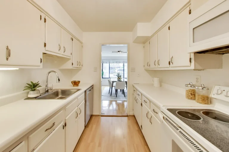 Kitchen with Dining Room View — 2501 Calvert St NW #103, Washington, DC