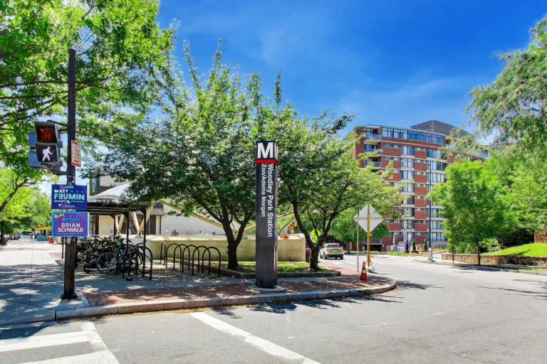 Woodley Park Metro Station Sign — near Shoreham North Condominium, 2501 Calvert St NW, Washington, DC