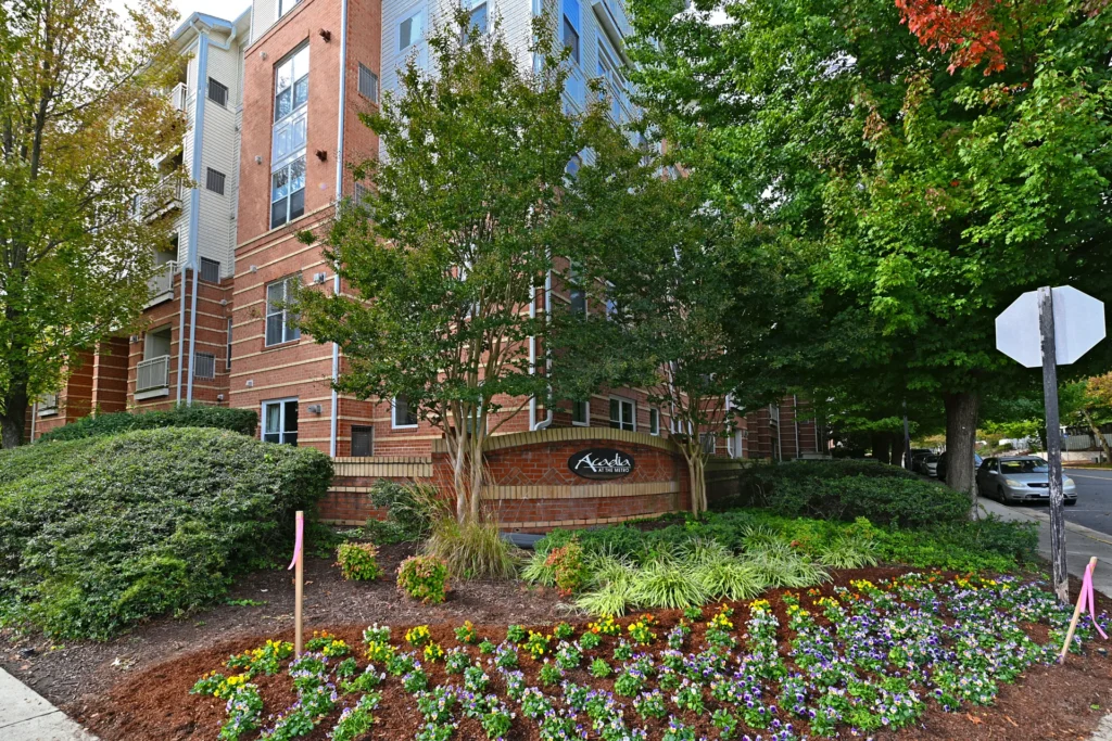 Landscaped entrance and sign of the Acadia condominium on Virginia Center Boulevard, Vienna VA